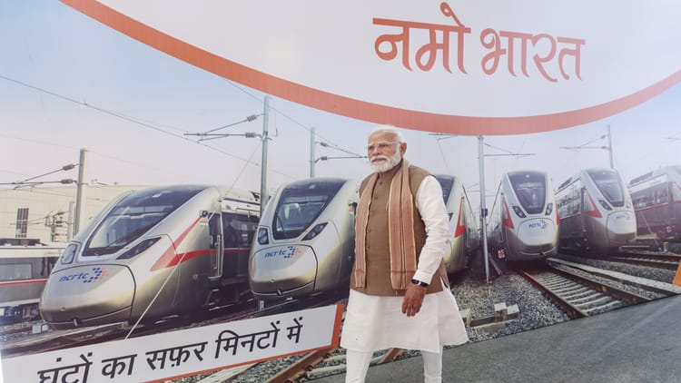 Namo - Namo Bharat: पश्चिम में नमो भारत तो पूरब में राजभर का शक्ति प्रदर्शन, भाजपा ने 2027 चुनाव का बिगुल फूंका!